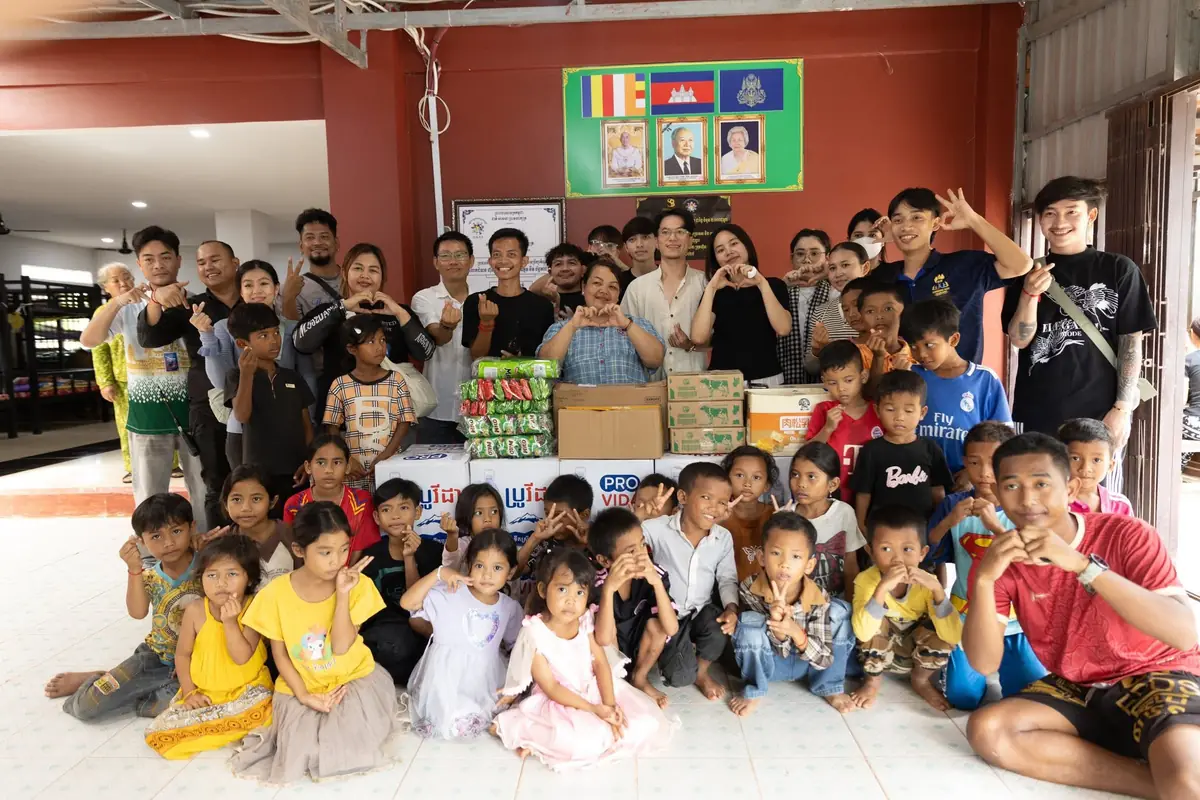 Anajak Foundation team with children during a charity visit